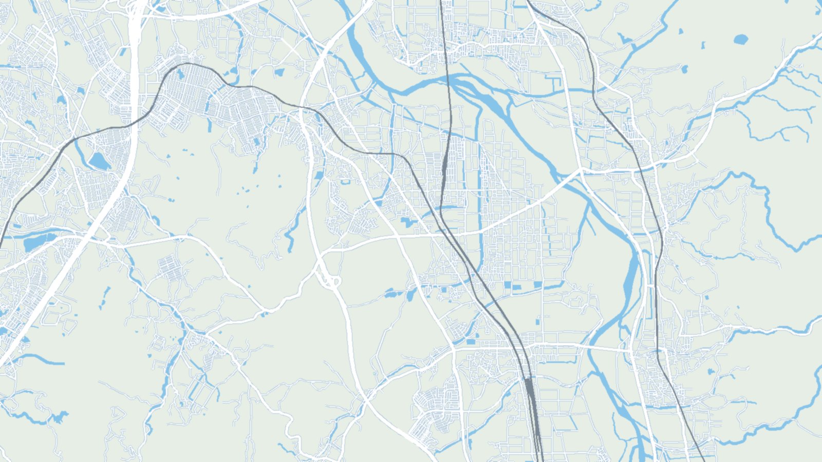 京田辺市の地形図。木津川の流れと市街地、鉄道、丘陵を描いたもの